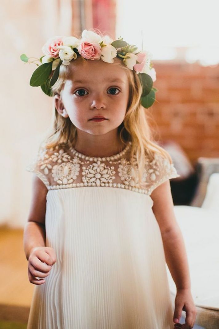 Adorable Flower Girl With Flower Crown And An Embellished Dress Full